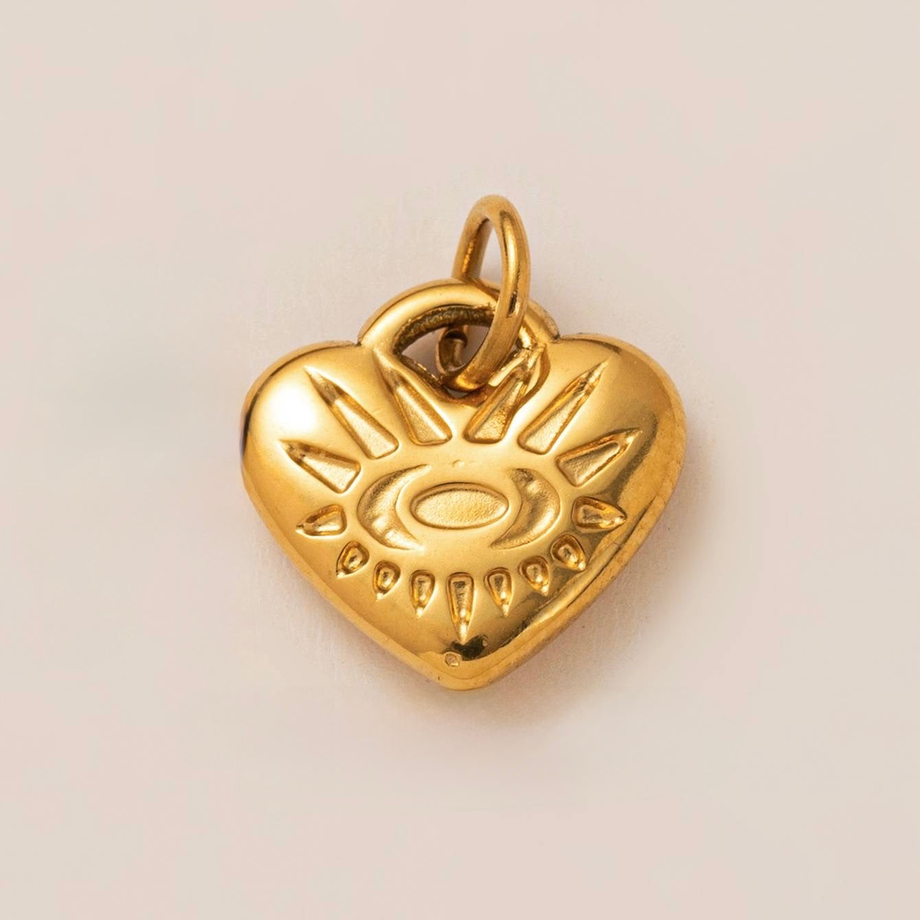 Heart sunburst charm