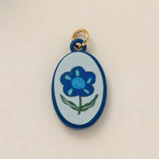 Painted blue flower charm